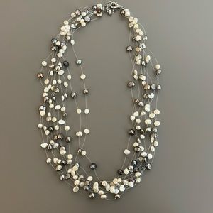 Multi strand pearl necklace.
